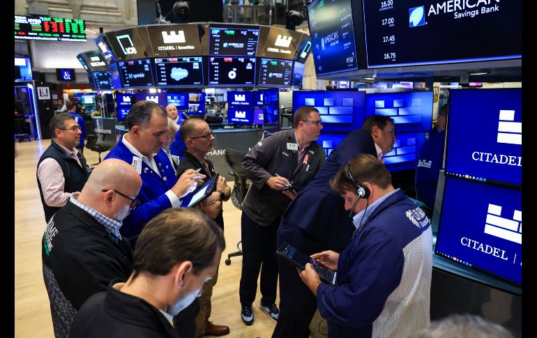 El mercado recuperó el apetito por el riesgo debido a que bajó el petróleo y la rentabilidad del bono del Tesoro a 10 años. AFP/T. Clary