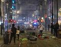 La policía de Milán reportó que dos mil jóvenes participaron en los disturbios la noche del sábado. AP / S. PORTA
