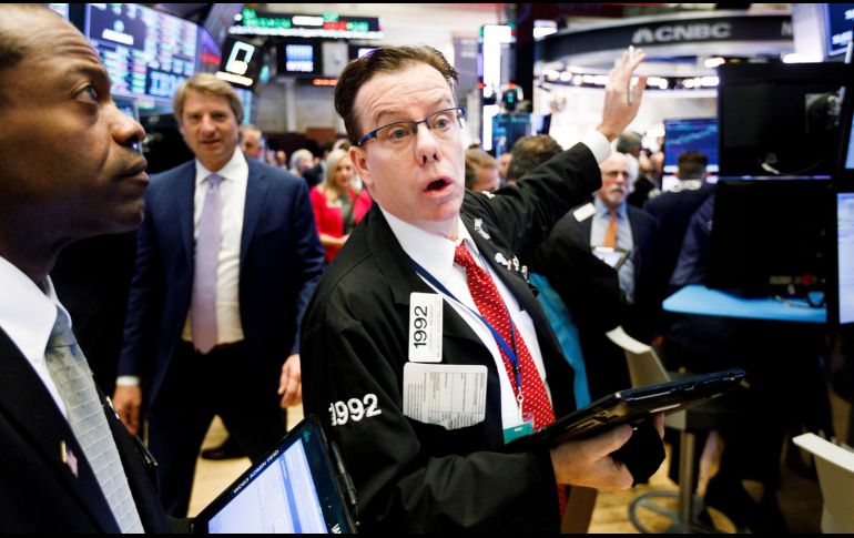 Este viernes estuvo marcado por las pérdidas; sin embargo, en el acumulado semanal el Dow Jones reportó un avance ligero. EFE/ARCHIVO