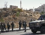Soldados israelíes se reúnen en el lugar de un ataque a tiros perpetrado por hombres armados palestinos en un cruce cerca de Hebrón, en la Cisjordania ocupada. AP/M. Illean