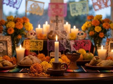 Colocar una vela blanca sin nombre en el altar es un gesto tradicional para dar la bienvenida y recordar a las almas desconocidas. IA/GEMINI